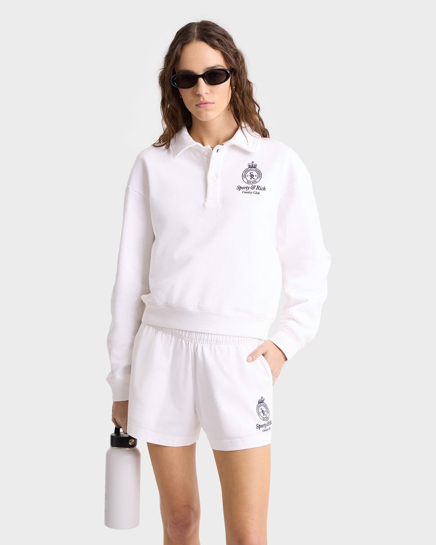 Sporty & Rich Crown Country Embroidered Cropped Polo in White