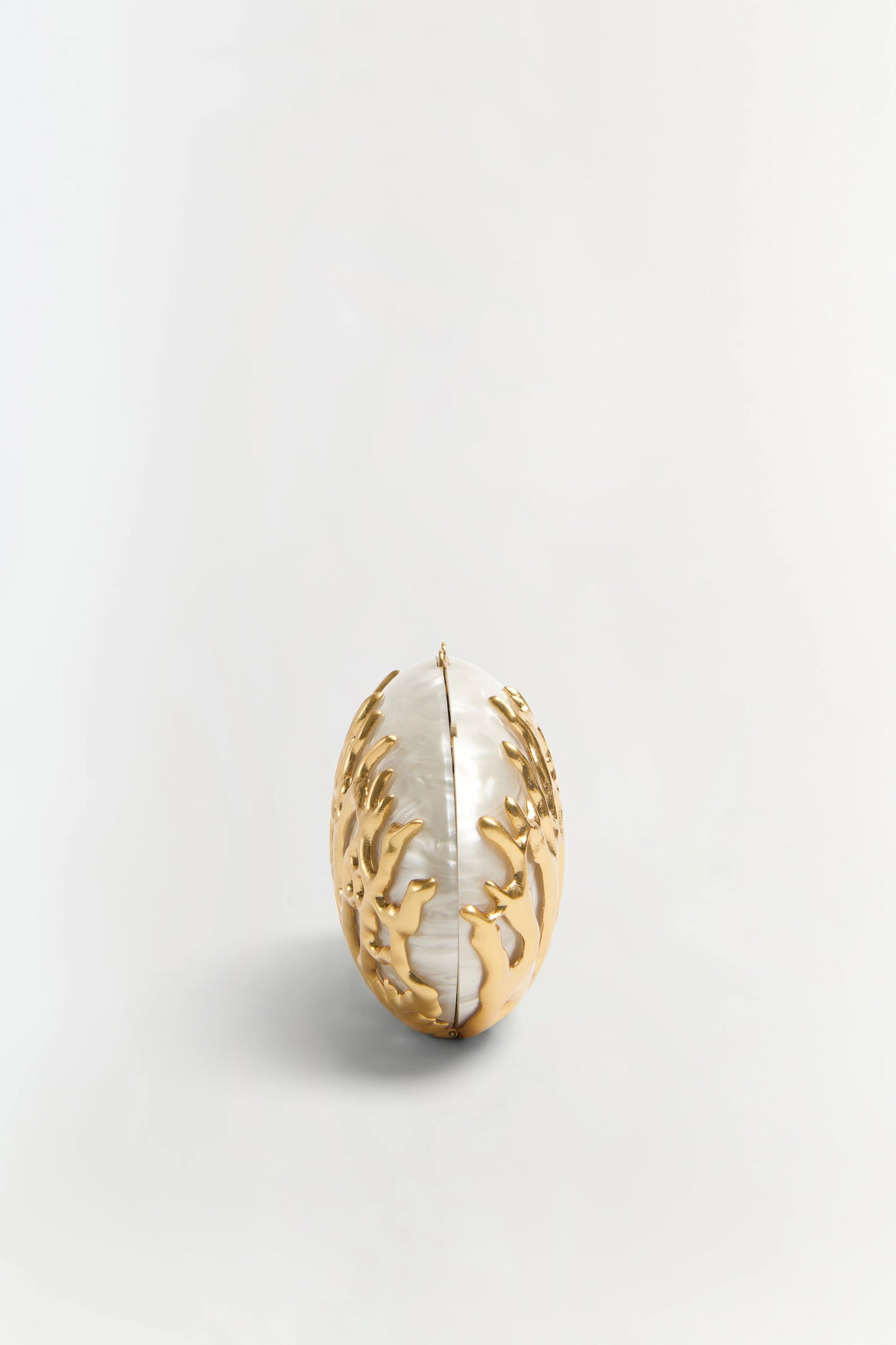 Simkhai Dylan Coral Clutch in Ivory Gold