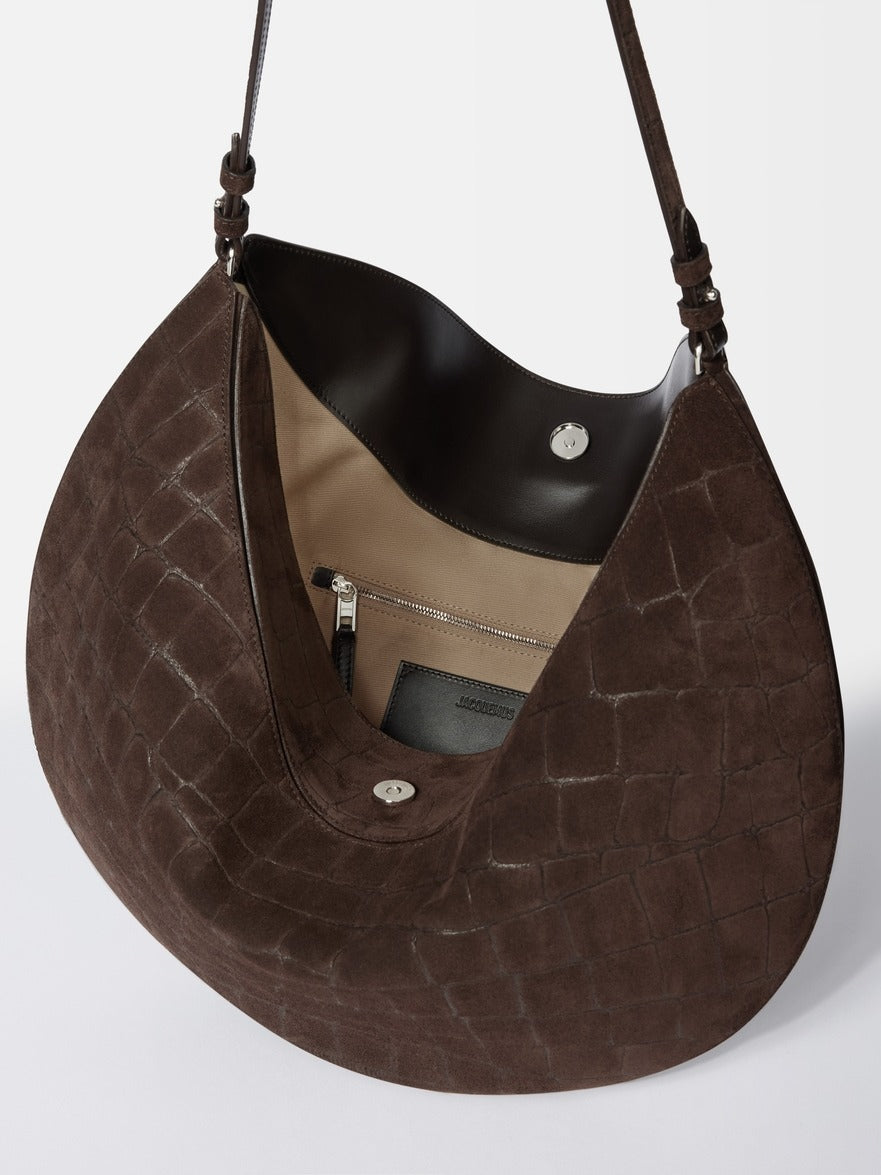 Jacquemus The Ovalo Bag in Dark Brown