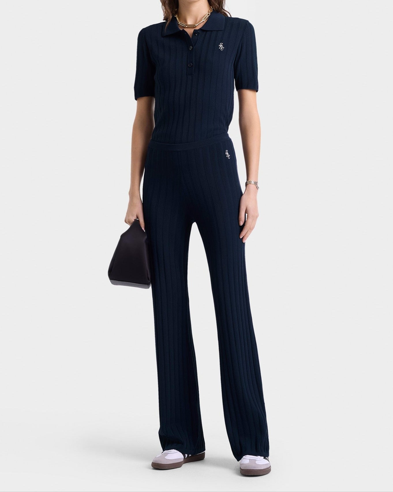 Sporty & Rich SRC Ribbed Trousers in Dark Navy