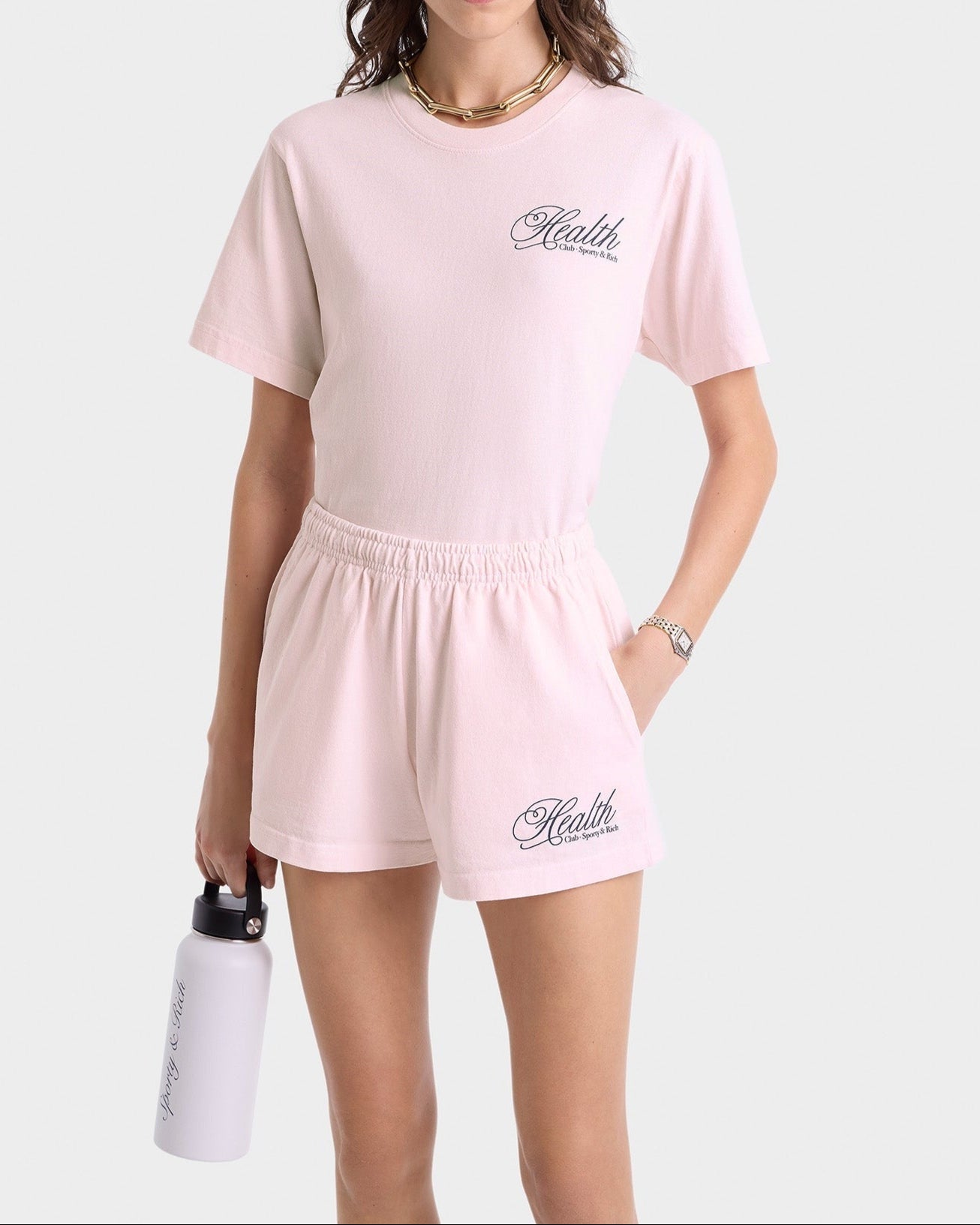 Sporty & Rich Health Script T-Shirt in Pink Dolphin