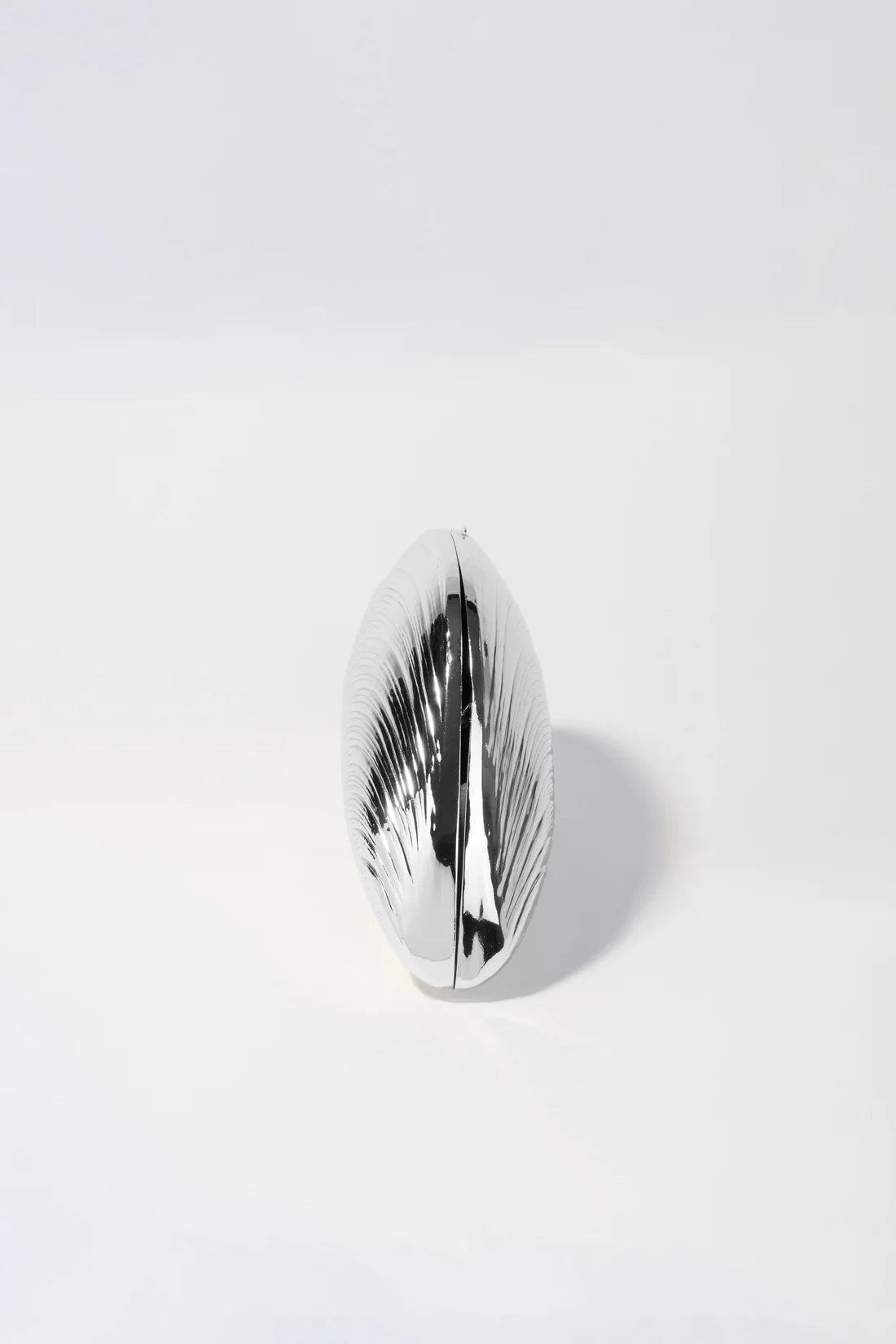 Simkhai Bridget Metal Oyster Clutch in Silver